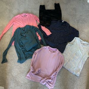 Lot of Athleta girl size small shirts and 1 legging